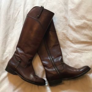Brown leather knee high Frye boots with zipper
